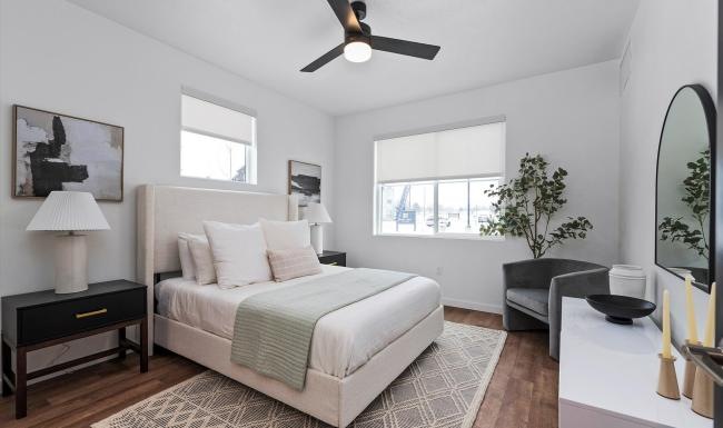 Beautiful bedrooms to fit every need a bedroom with a bed and a fan