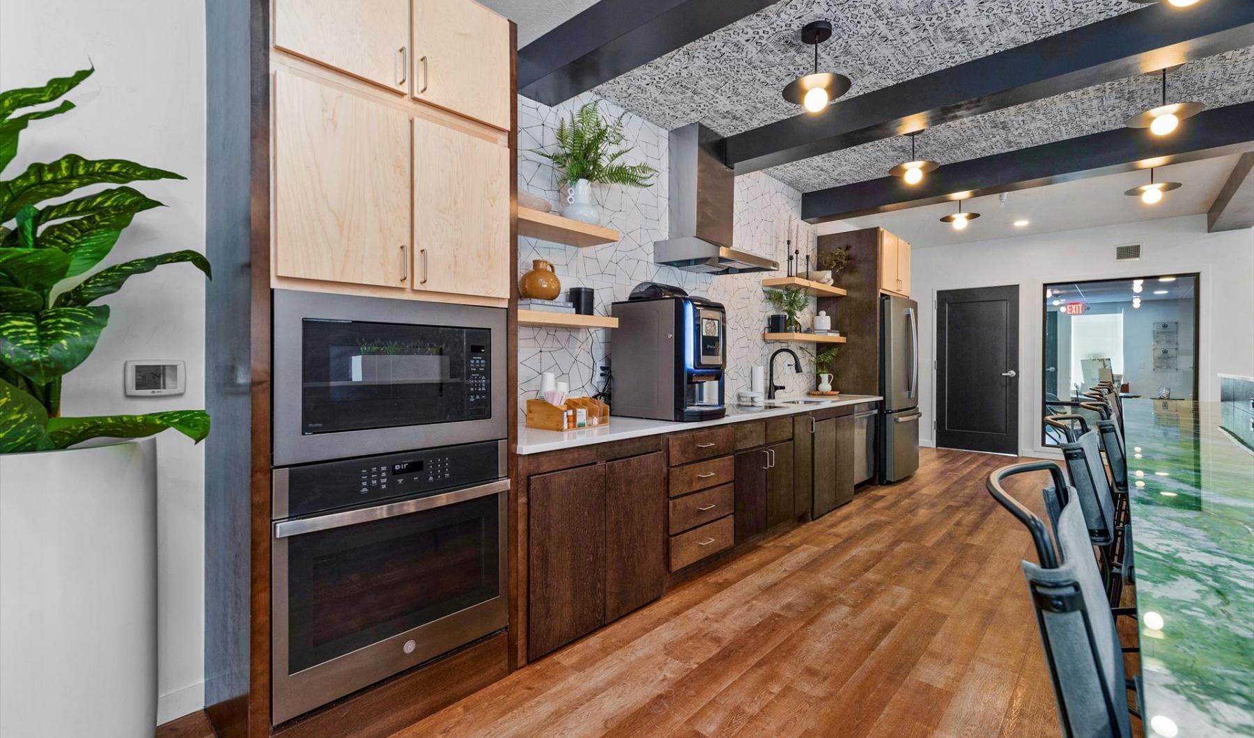 Enjoy our resident-only features a kitchen with wooden cabinets